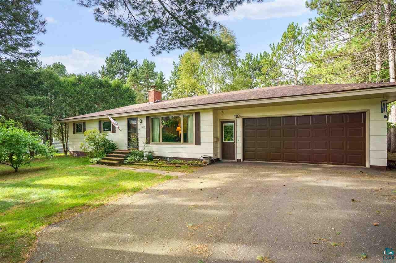 Property Photo:  1417 Carlton Ave W  MN 55720 