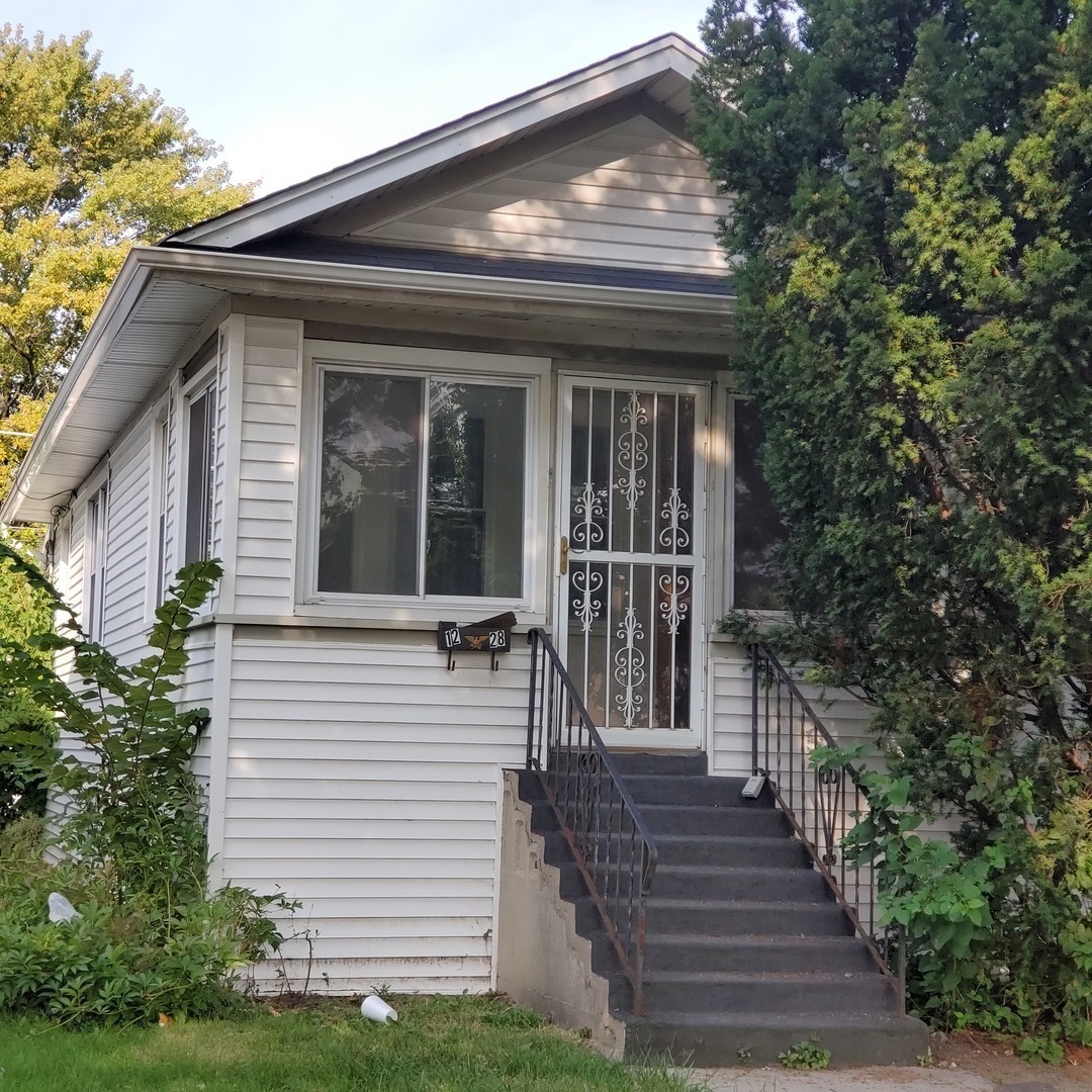 Property Photo:  1228 South 19th Avenue  IL 60153 