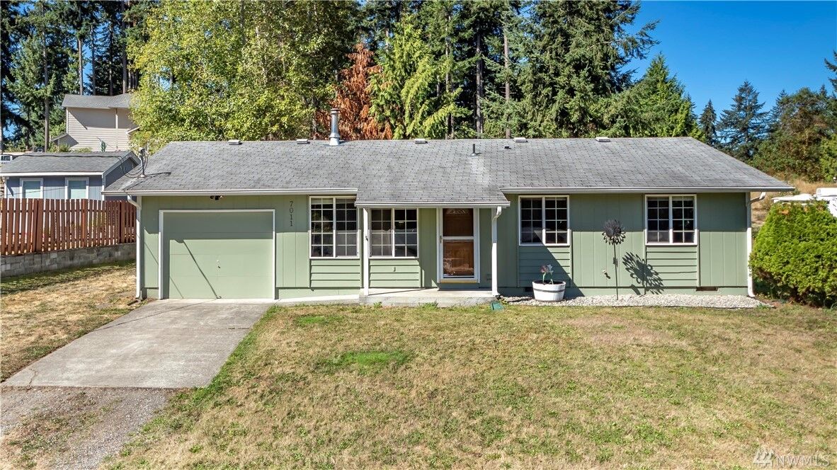 Property Photo:  7011 Locust Ave E  WA 98391 