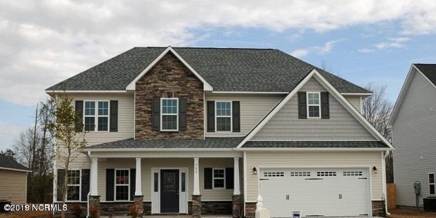 Property Photo:  717 Kiwi Stone Circle  NC 28546 