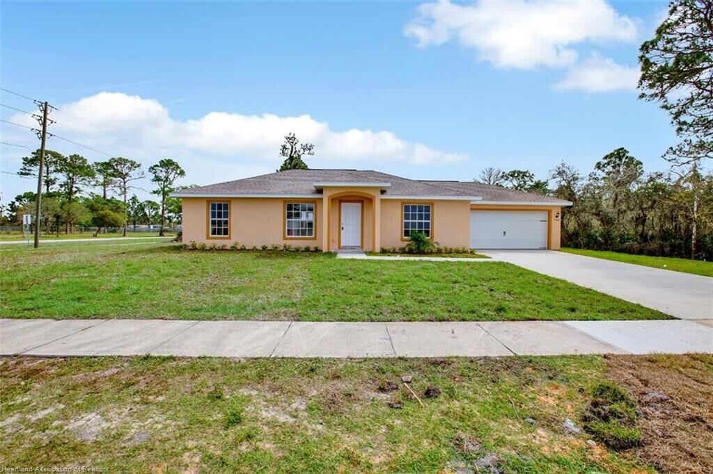 Property Photo: 1386 Cougar Boulevard FL 33872