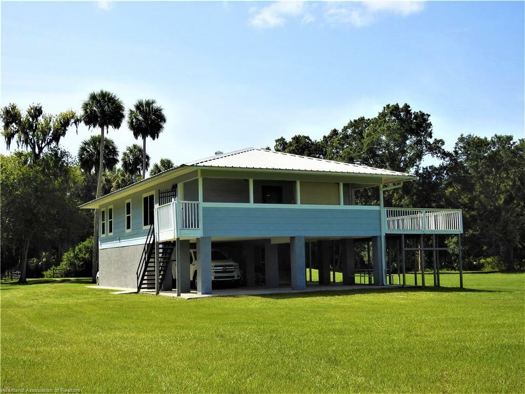 Property Photo:  4972 S Hammock Road  FL 33890 