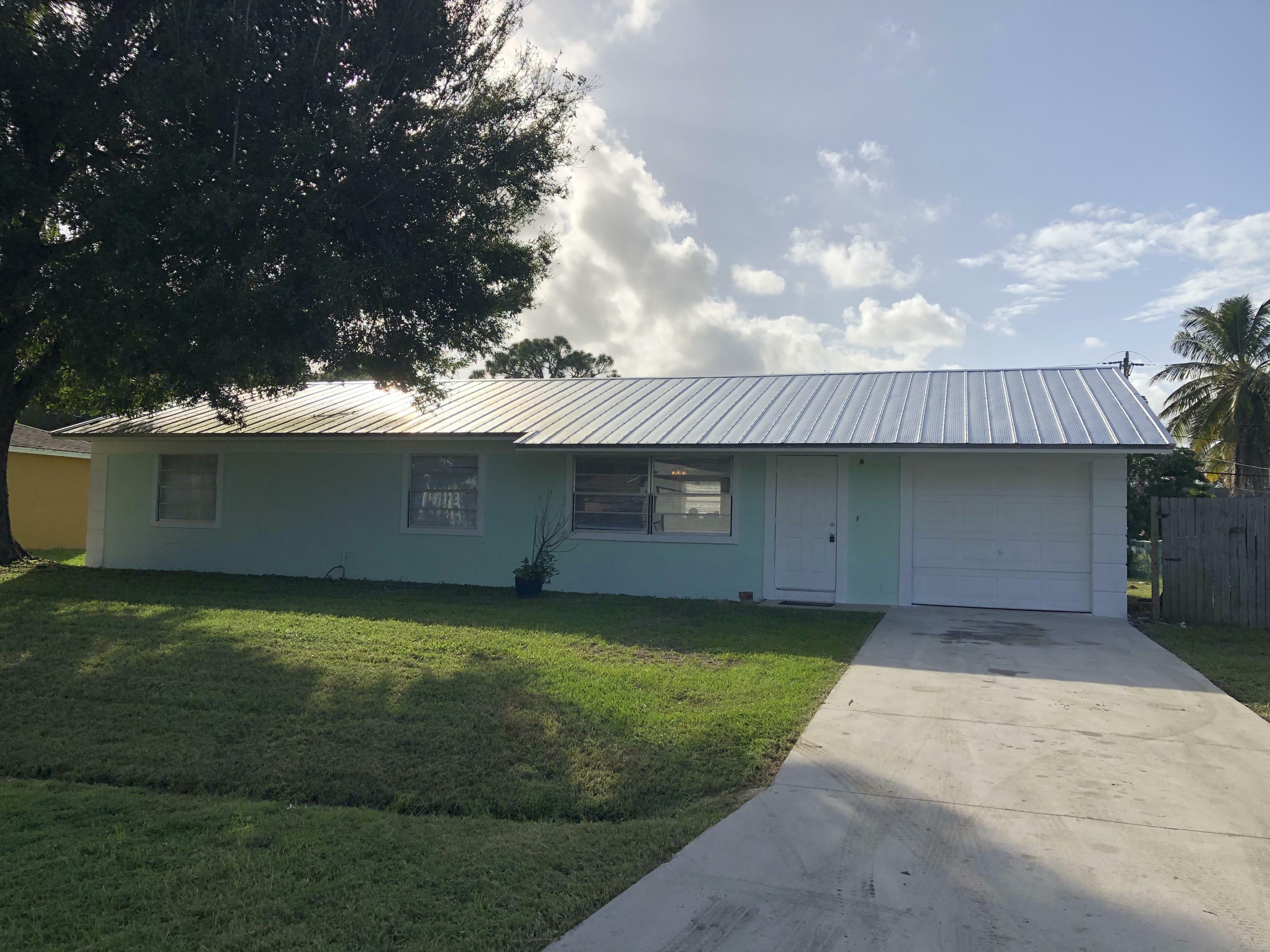 Property Photo:  1168 SW Hutchins Street  FL 34983 