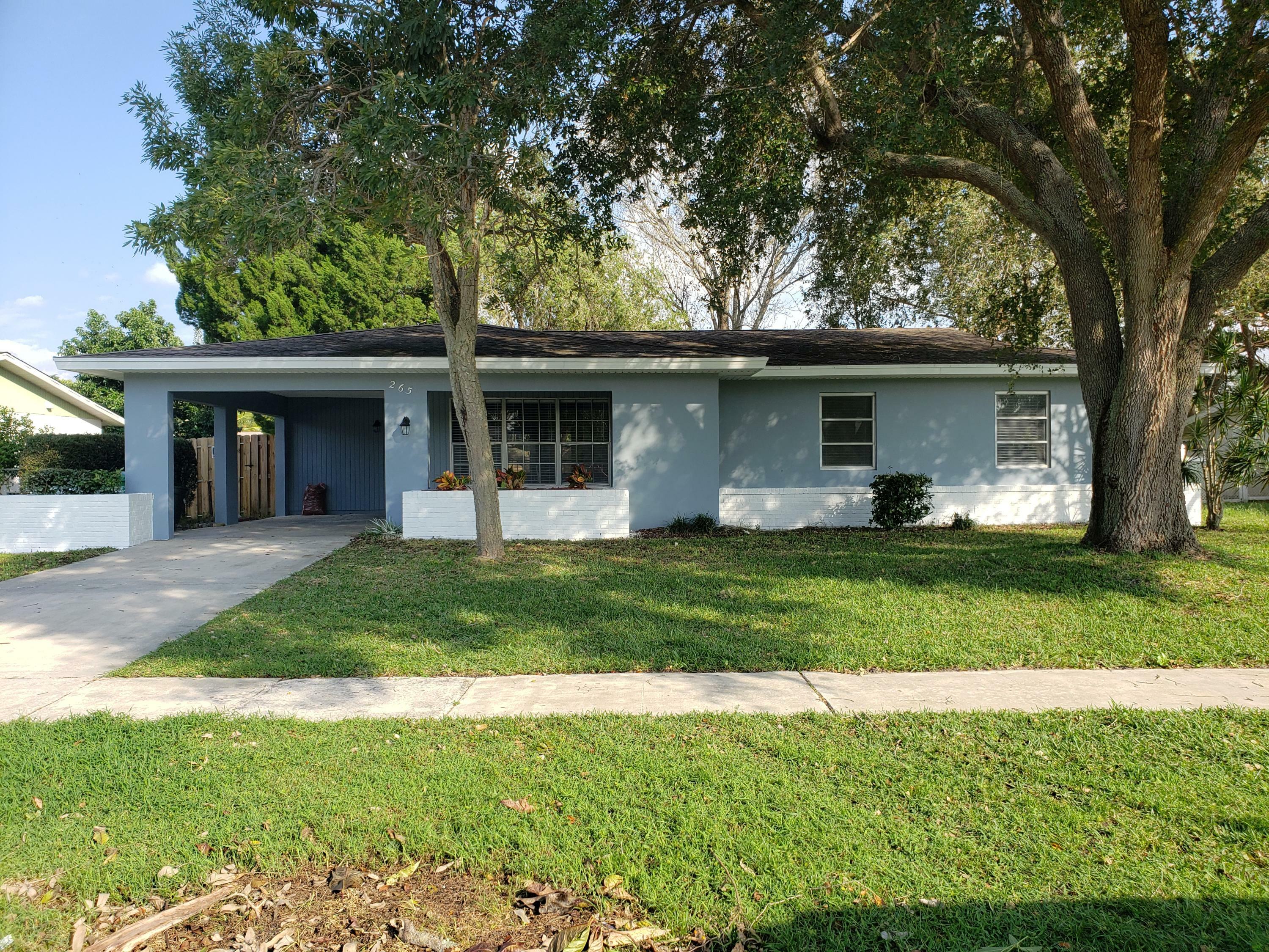 Property Photo:  265 NE Mainsail Street  FL 34983 