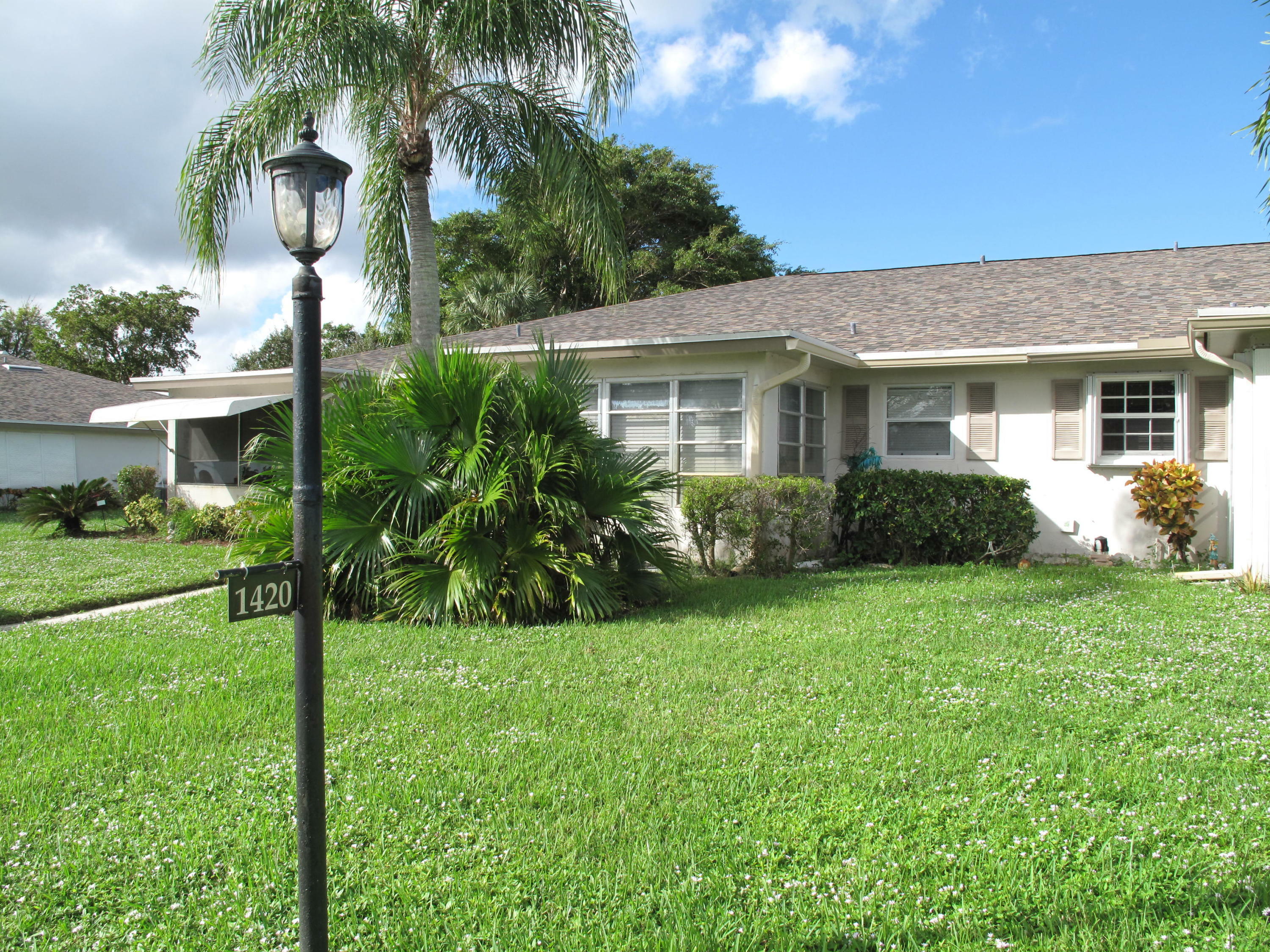 Property Photo:  1420 High Point Way SW B  FL 33445 