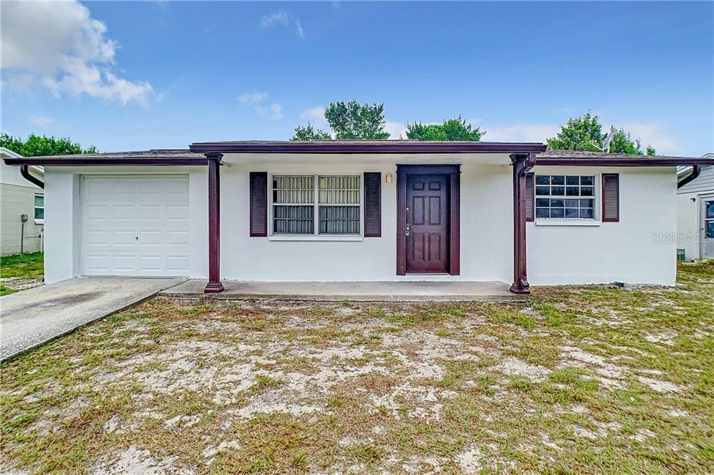 Property Photo:  9821 Richwood Lane  FL 34668 