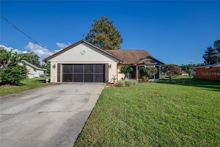 Property Photo:  26620 Cayman Drive  FL 32778 