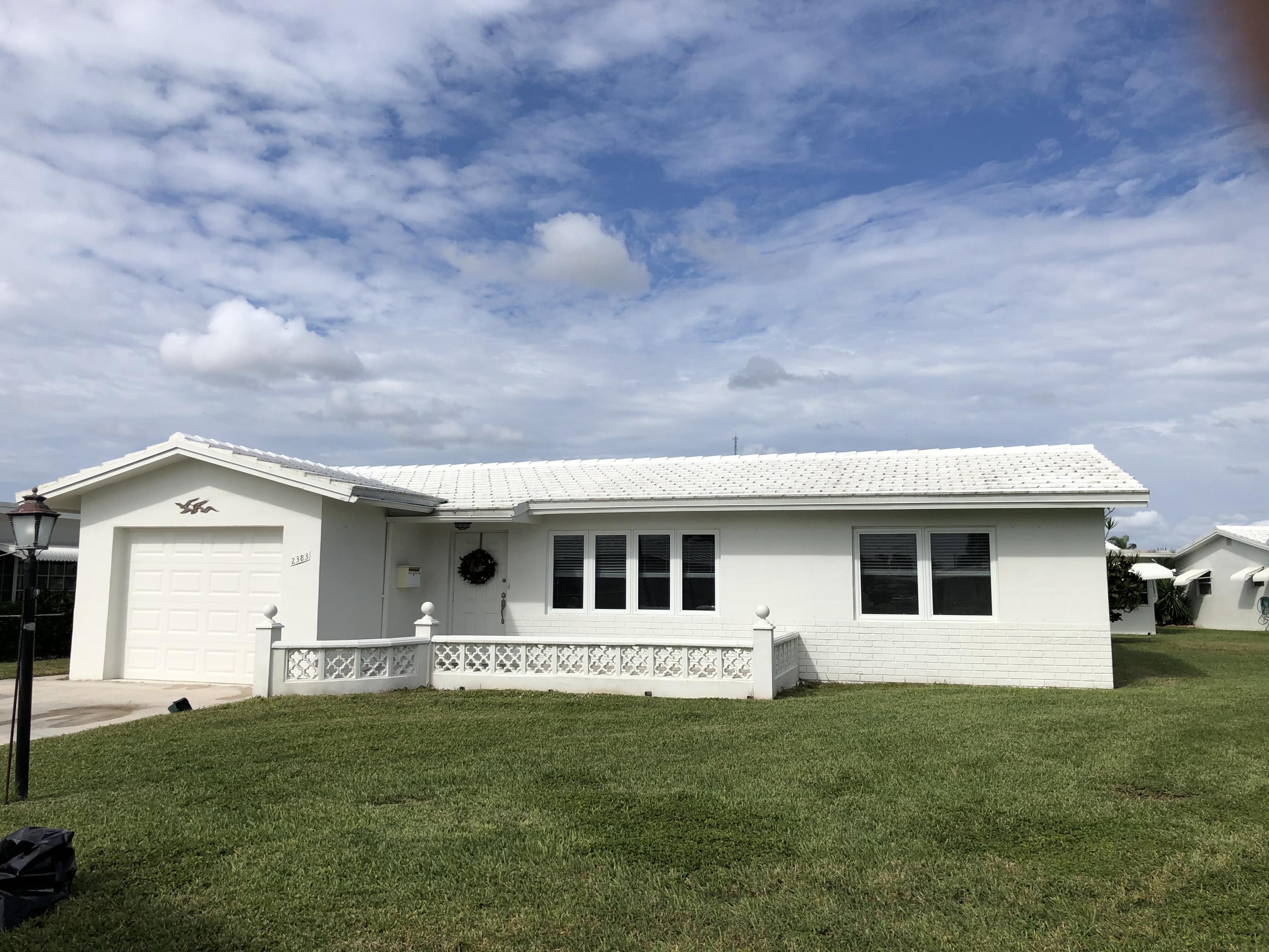 Property Photo: 2383 SW 13th Avenue FL 33426