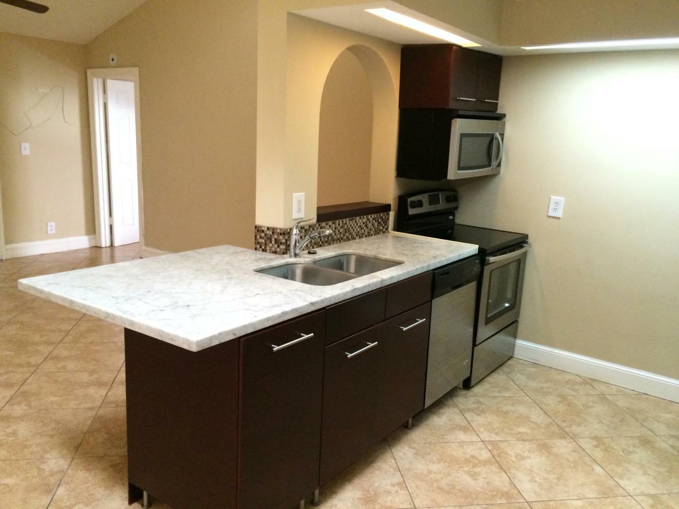 Property Photo:  4181 S 57th Avenue G  FL 33463 