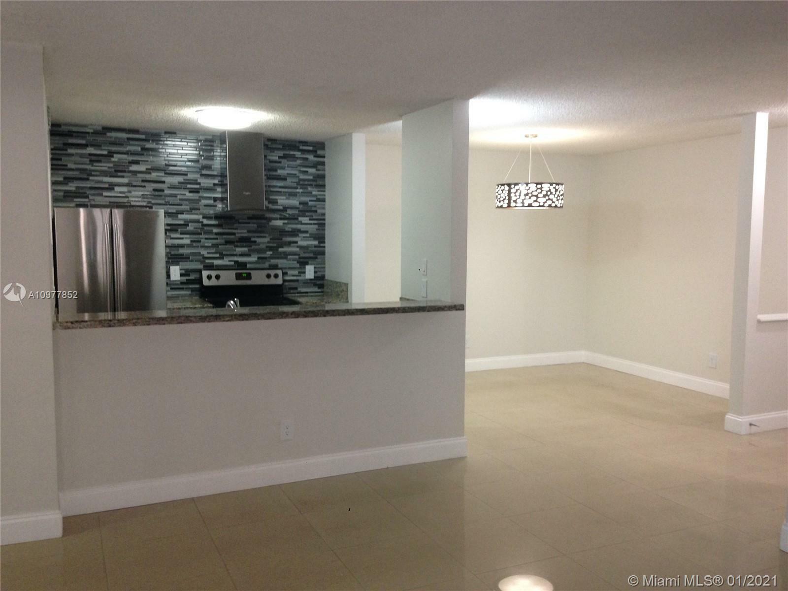 Property Photo:  10520 SW 158th Ct 203  FL 33196 