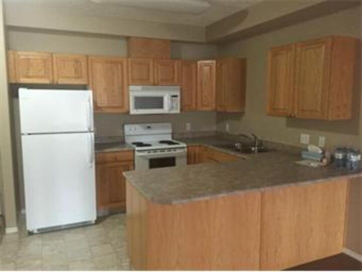 Property Photo: 9810 94 Street #201 AB T8S 0A1