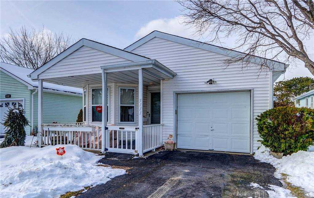 Property Photo: 5111 Village Cir E NY 11949