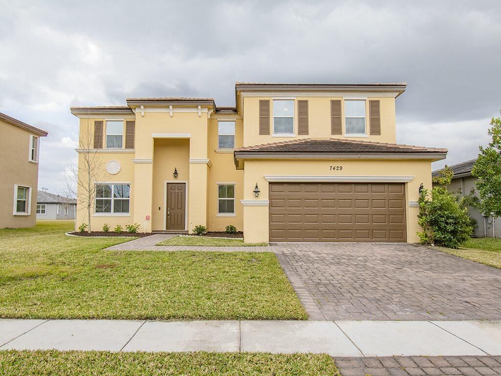 Property Photo:  7429 NW Greenspring Street  FL 34987 