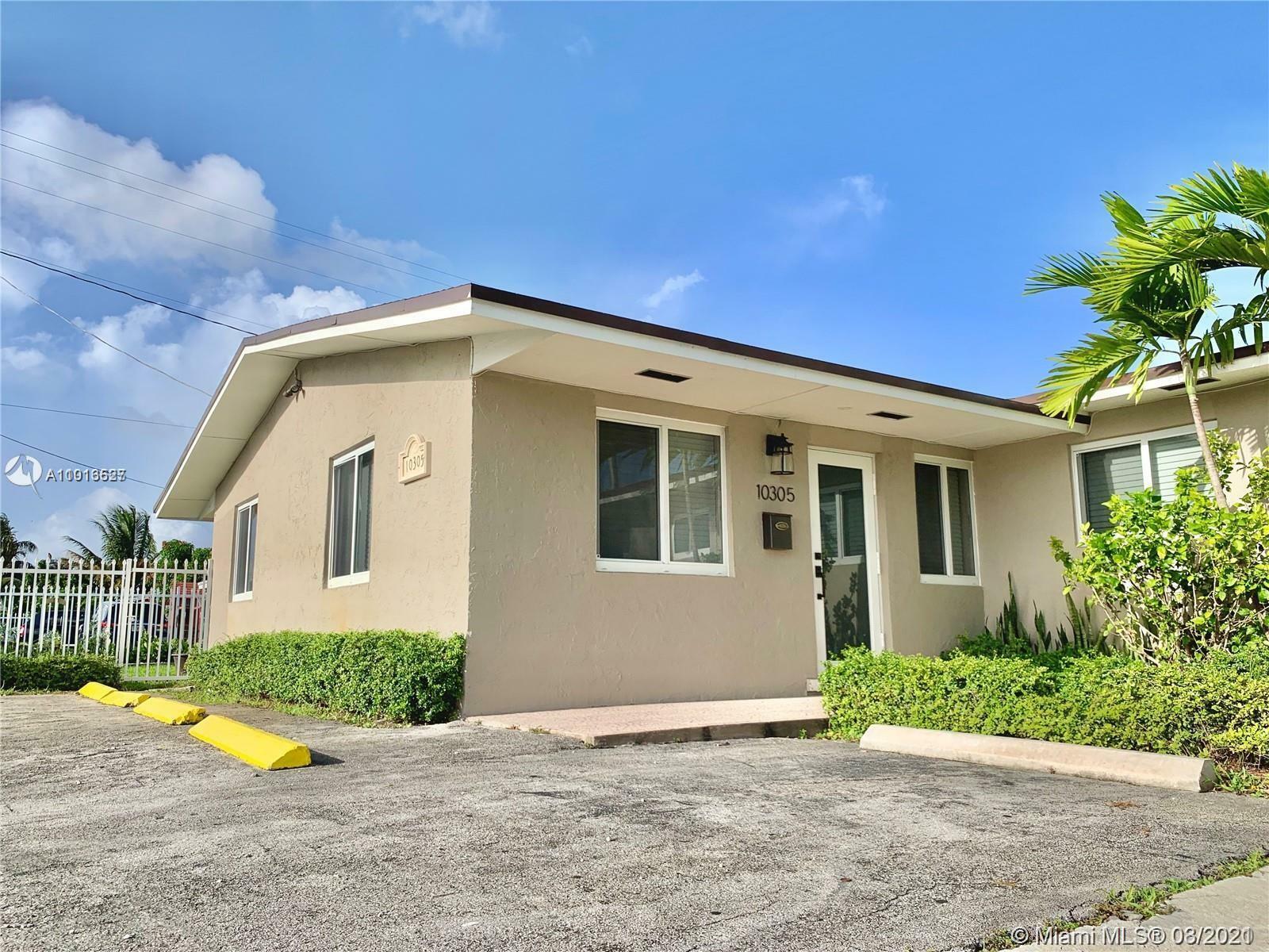 Property Photo:  10303 NW 35th Pl 10305  FL 33147 