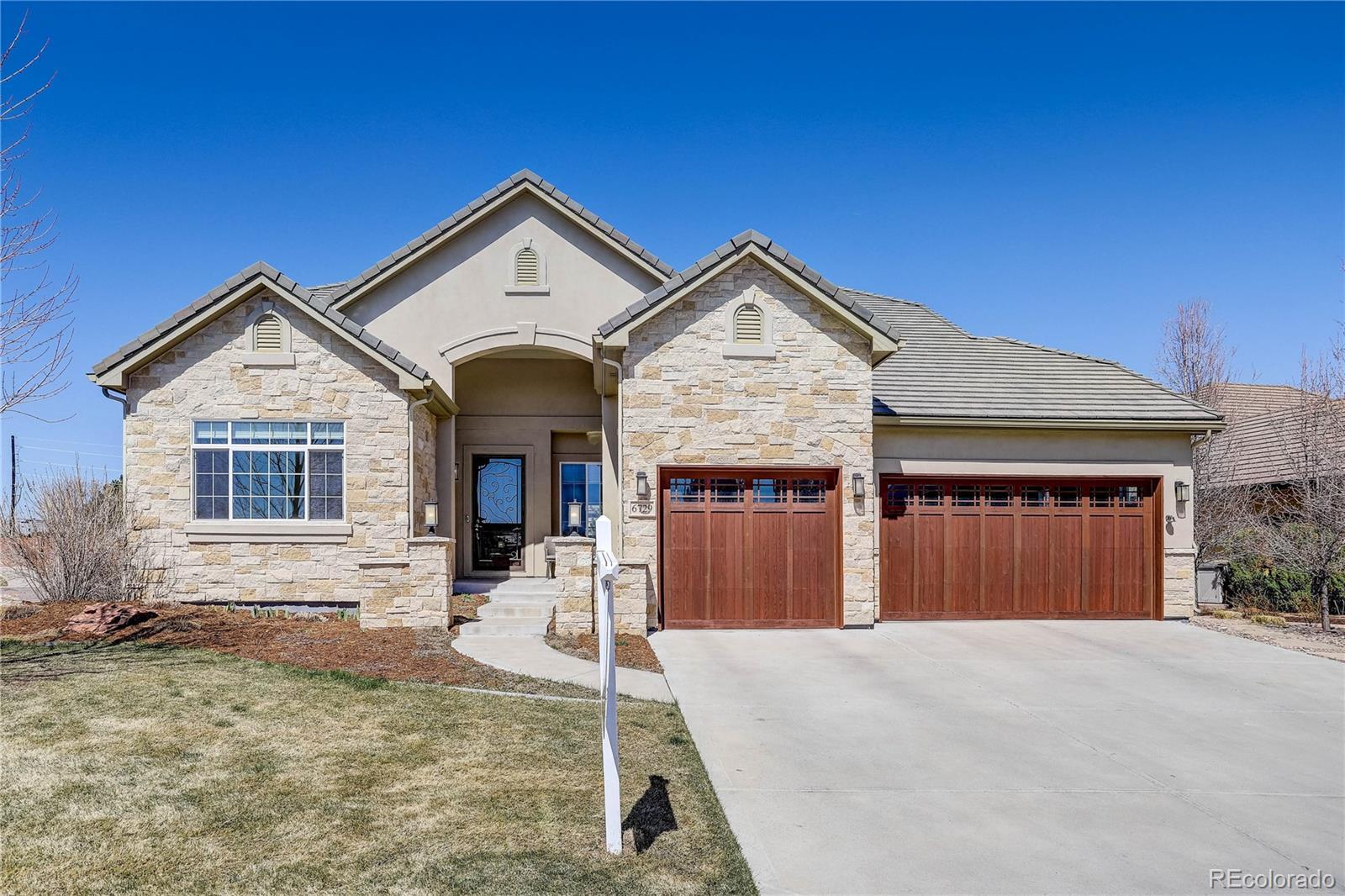 Property Photo: 6729 S Zenobia Court CO 80128