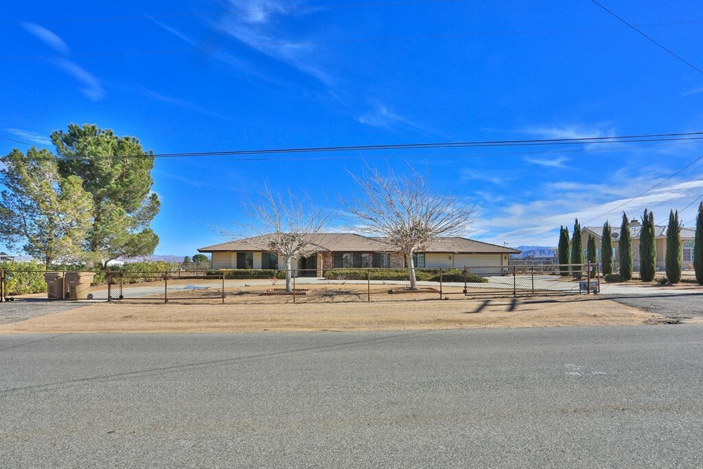 Property Photo:  11427 Pinon Avenue  CA 92345 