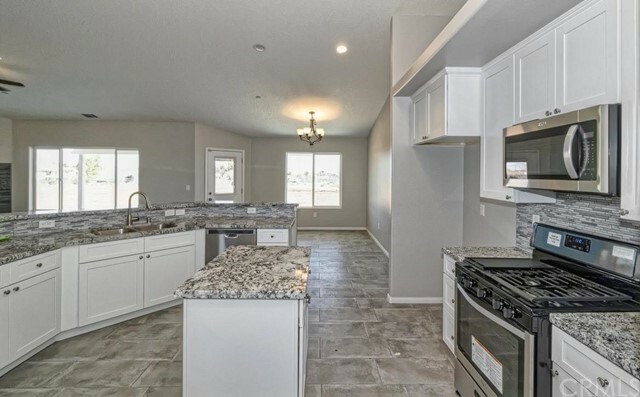 Property Photo:  7476 Victor Avenue  CA 92345 