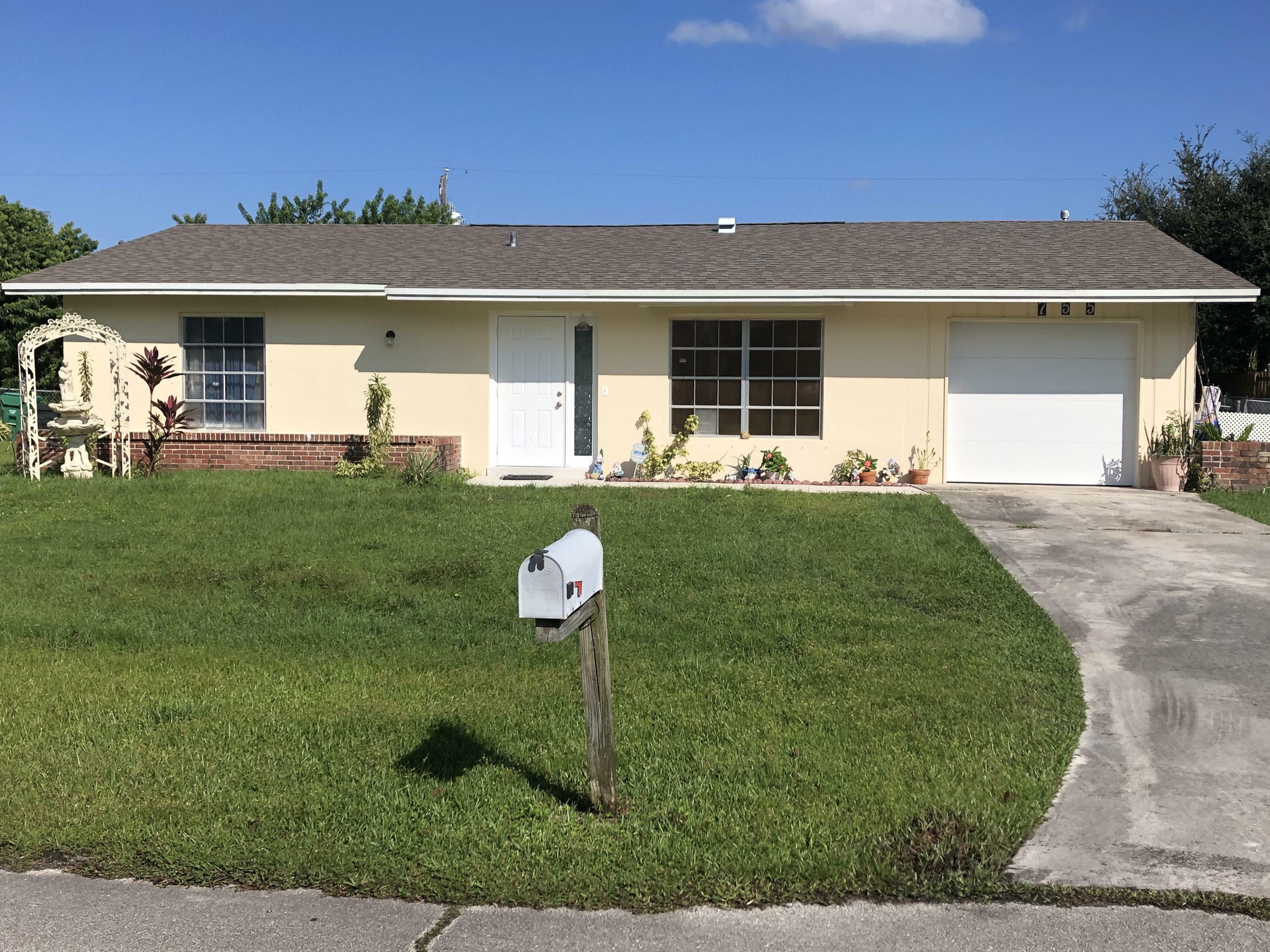 Property Photo: 755 SW Broadview Street FL 34983