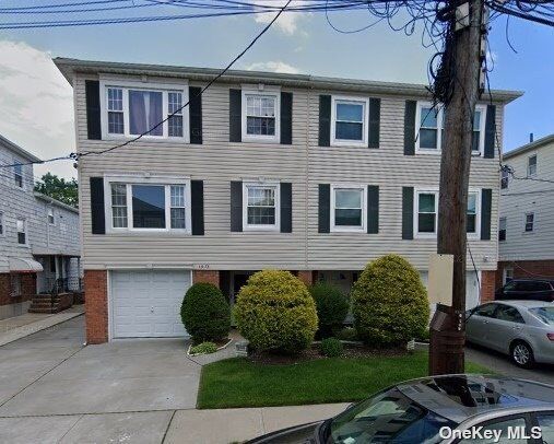 Property Photo: 15-75 208th Place 1 NY 11360