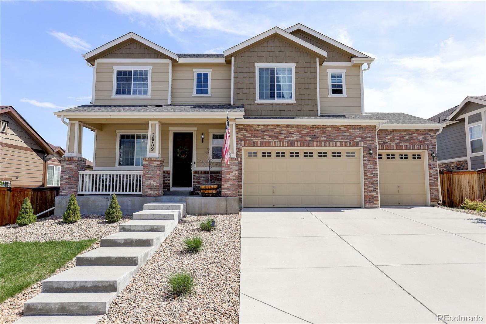 Property Photo:  20709 E Brunswick Place  CO 80013 