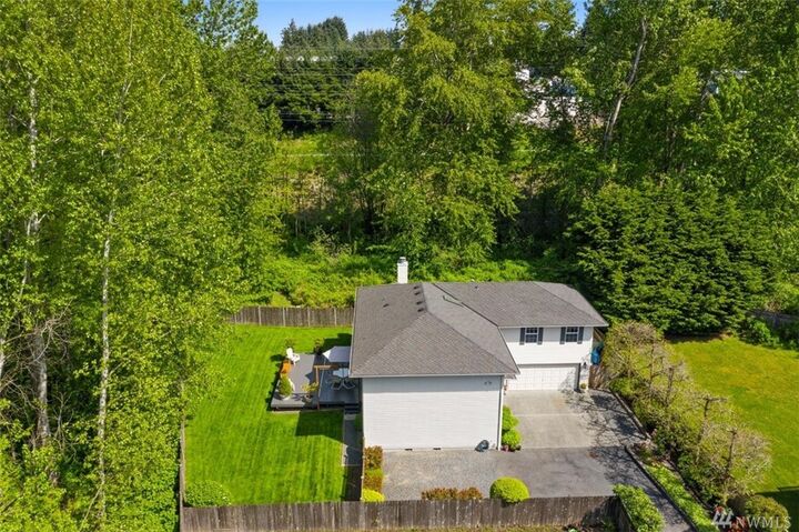 Property Photo: 8711 10 Dr SE WA 98208