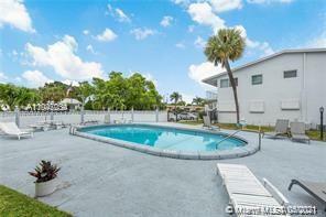 Property Photo: 2000 NE 51st Ct 103 FL 33308