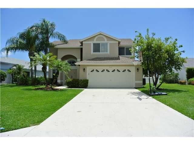 Property Photo:  9614 Arbor Meadow Drive  FL 33437 