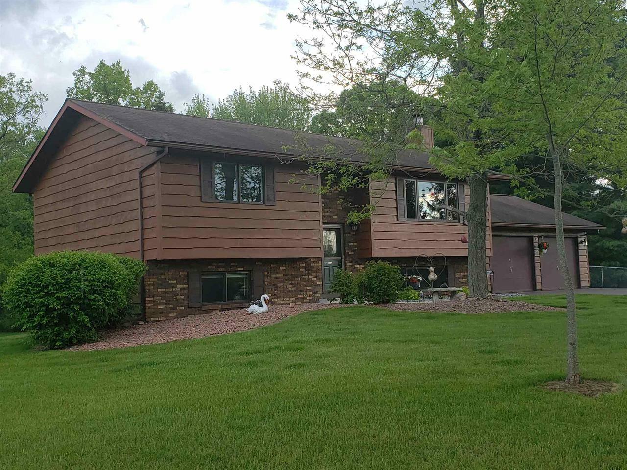 Property Photo:  166345 Blue Anchor Drive  WI 54471 