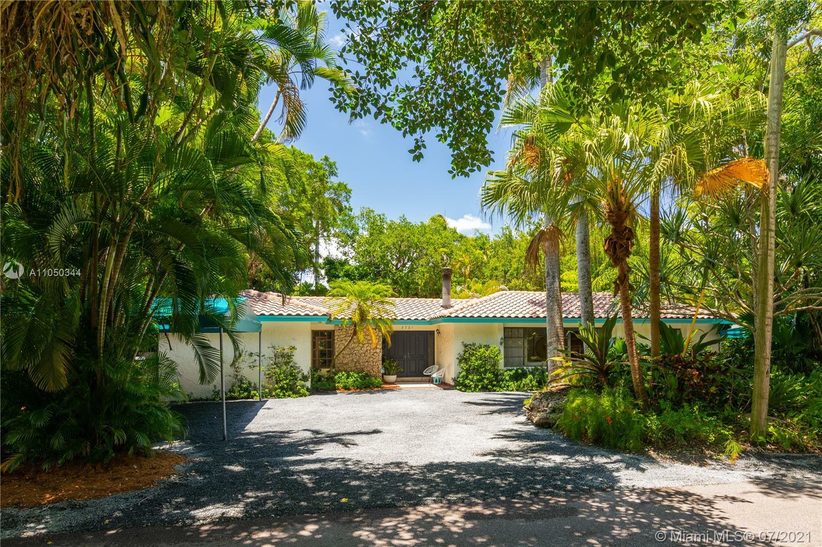 Property Photo:  3701 Poinciana Ave  FL 33133 