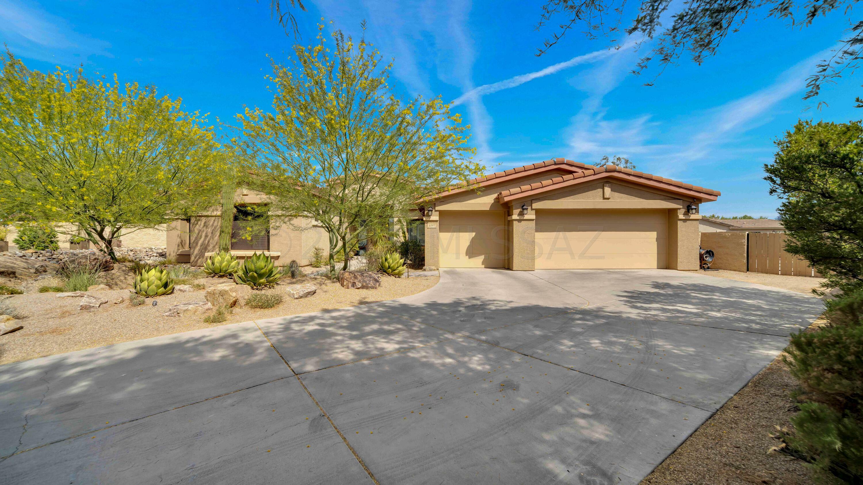 Property Photo:  1597 W Copper Sky Drive  AZ 85737 