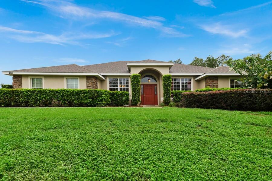 Property Photo:  10430 Lago Louisa Court  FL 34711 