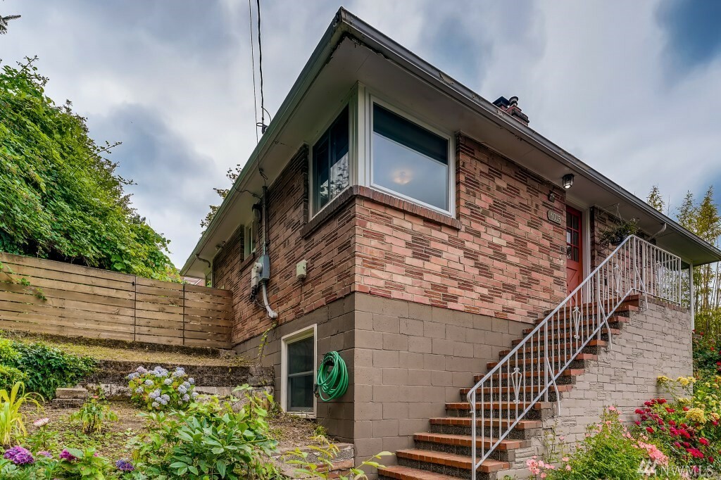 Property Photo:  6015 33rd Ave S  WA 98118 