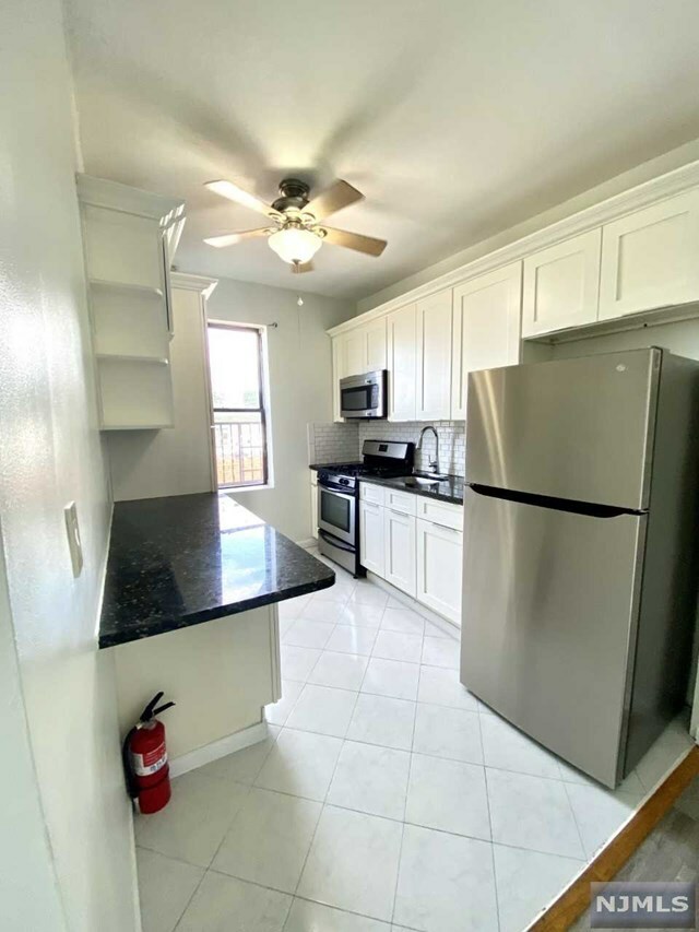 Property Photo:  9017 Bergenwood Avenue 6  NJ 07047 