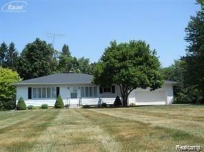 Property Photo:  6286 Calkins Road  MI 48532 