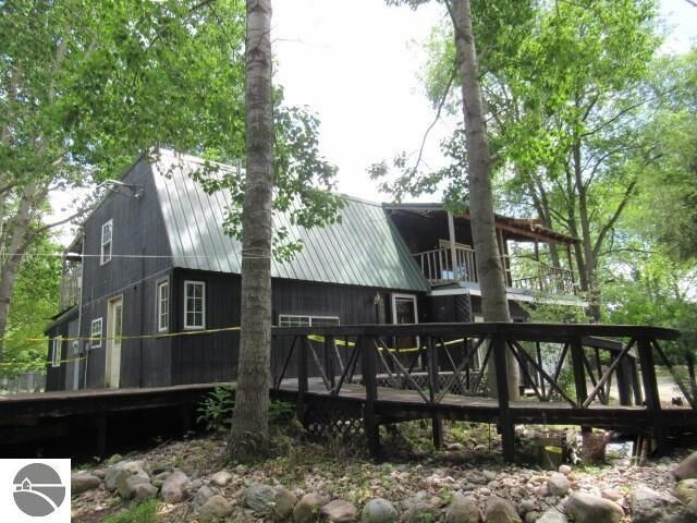 Property Photo:  9725 Lake Of The Woods Road  MI 49659-0000 