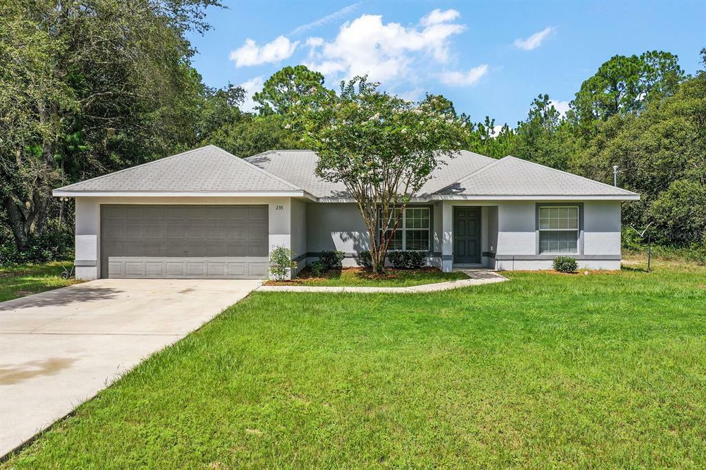 Property Photo:  233 Fisher Way  FL 32179 