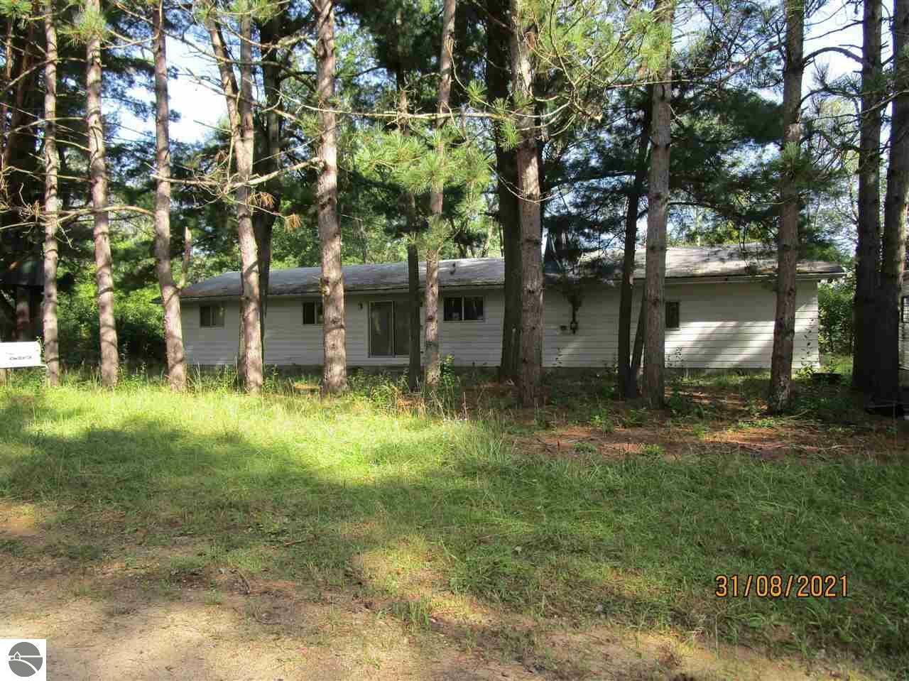 Property Photo:  10013 E Beal City Road  MI 48858 