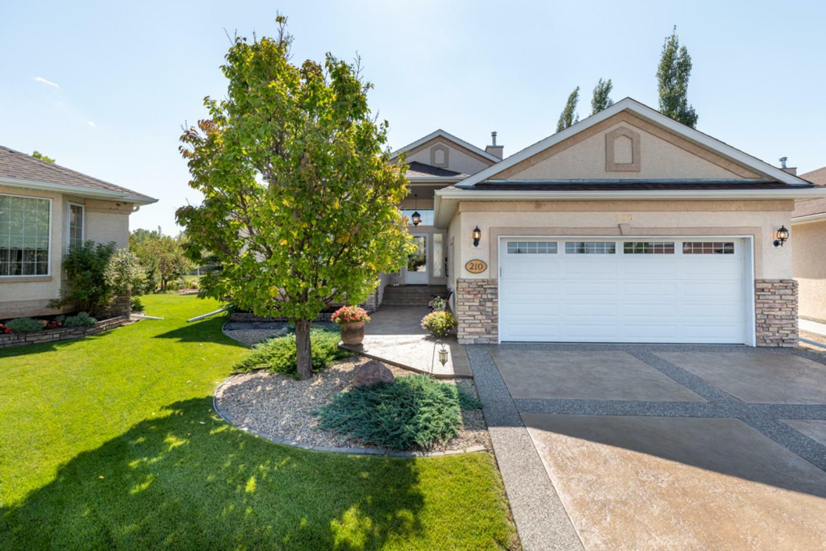 Property Photo: 210 Riverside Court NW AB T1V 1X4