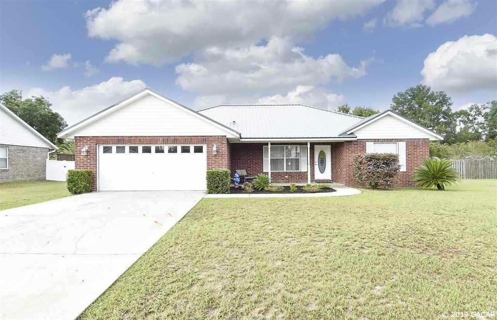 Property Photo:  25586 SW 21st Place  FL 32669 