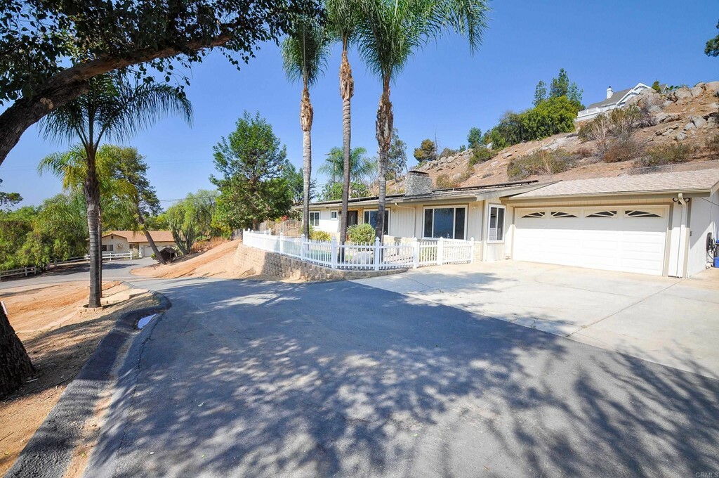 Property Photo:  9924 Blossom Valley Road  CA 92021 