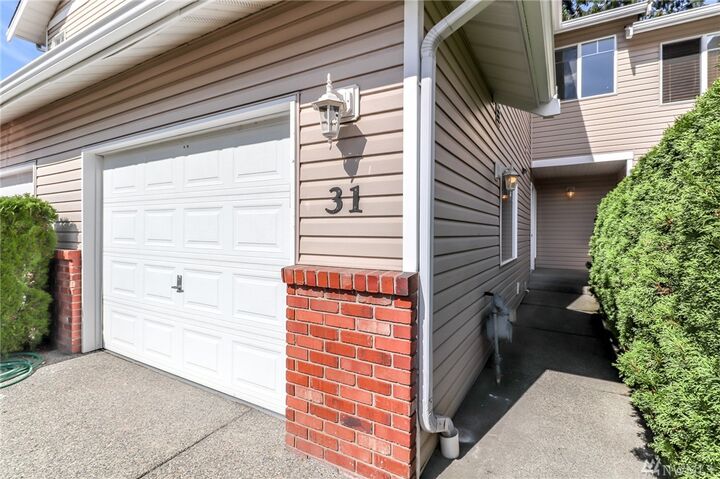Property Photo:  15414 35th Ave W 31 F  WA 98087 