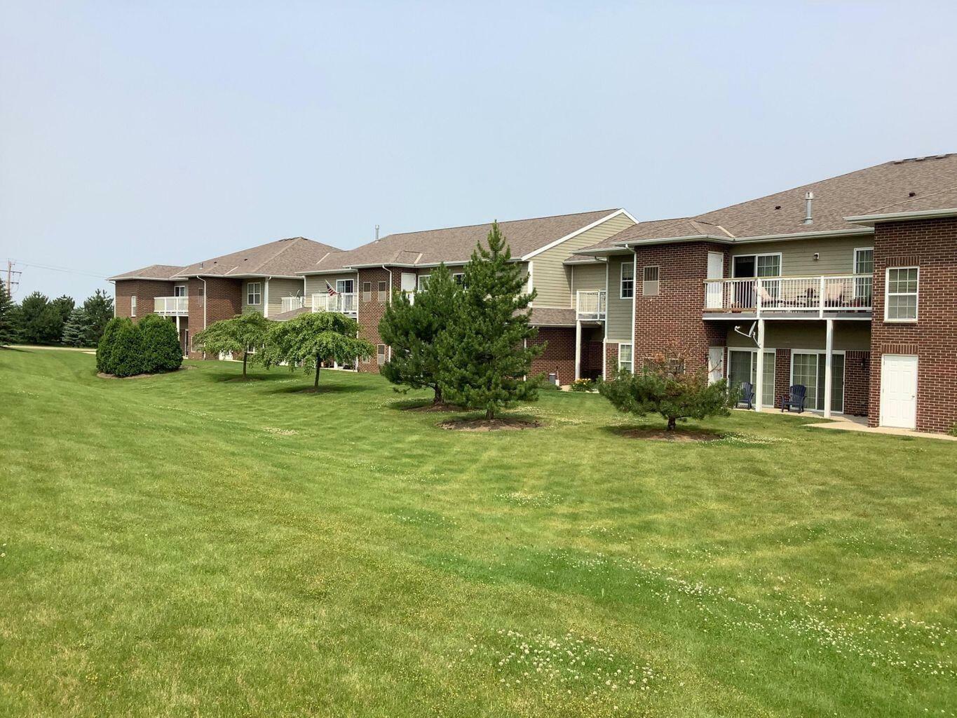 Property Photo:  6865 99th Pl H  WI 53158 