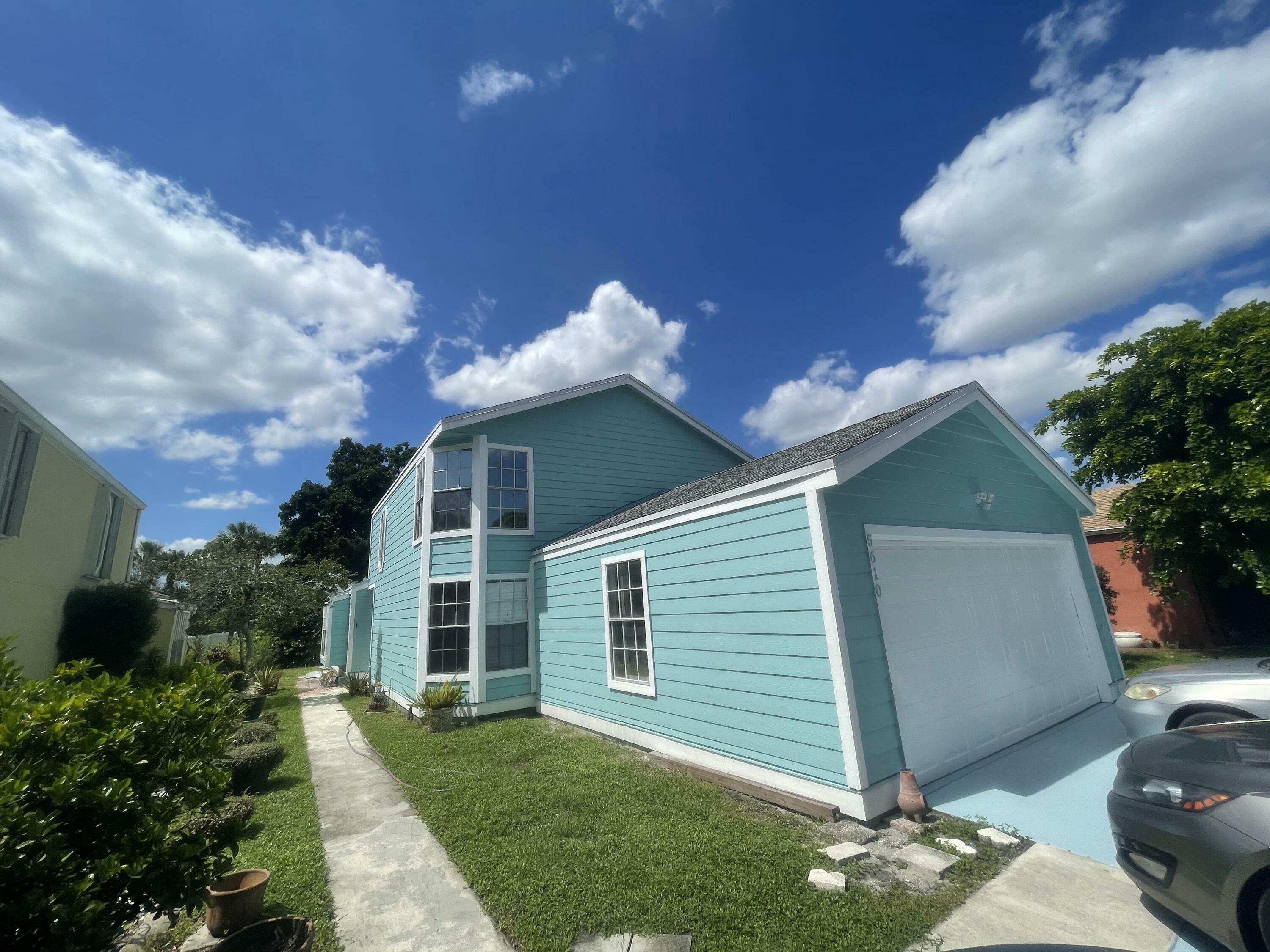 Property Photo:  5610 Dewberry Way  FL 33415 