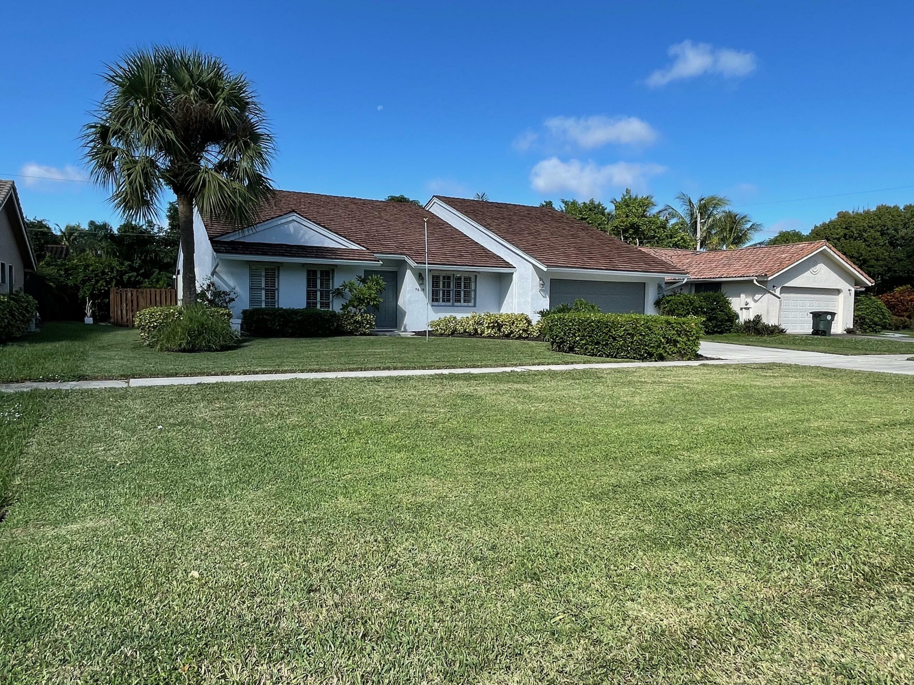 Property Photo:  7619 W Country Club Boulevard  FL 33487 