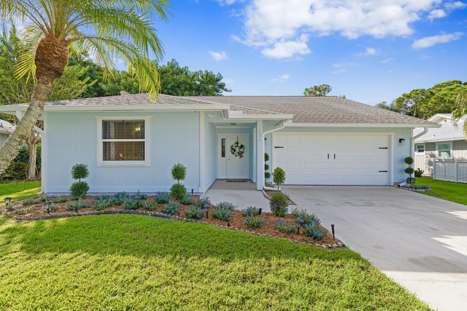 Property Photo:  6894 SE Raintree Avenue  FL 34997 