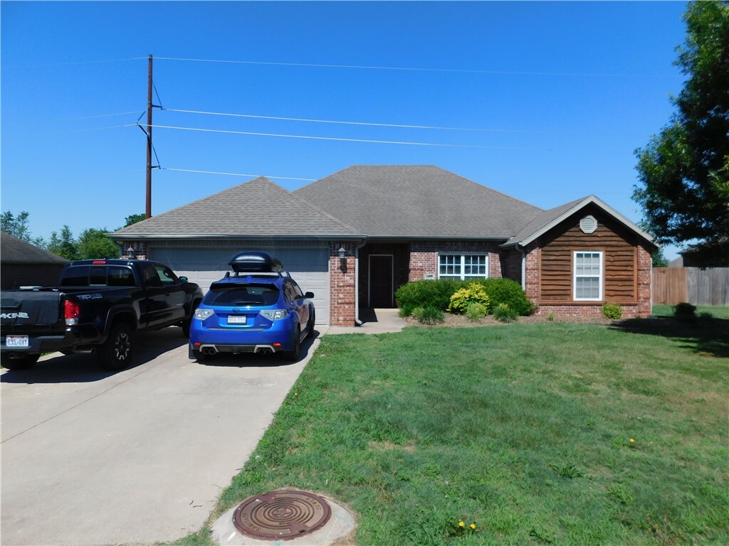 Property Photo:  4400 SW Lilly Street  AR 72713 