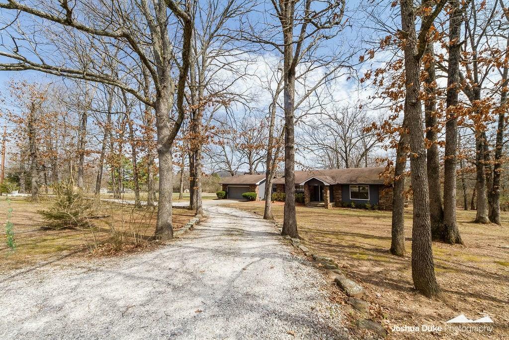 Property Photo:  3988 S Butterfield Trail  AR 72701 