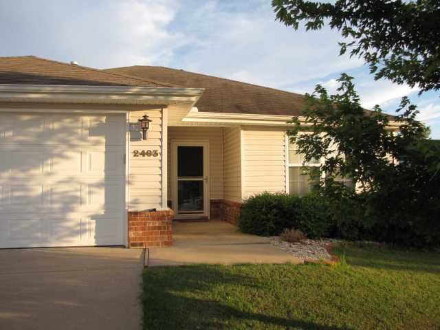 Property Photo:  2403 SW Pawnee Street  AR 72712 