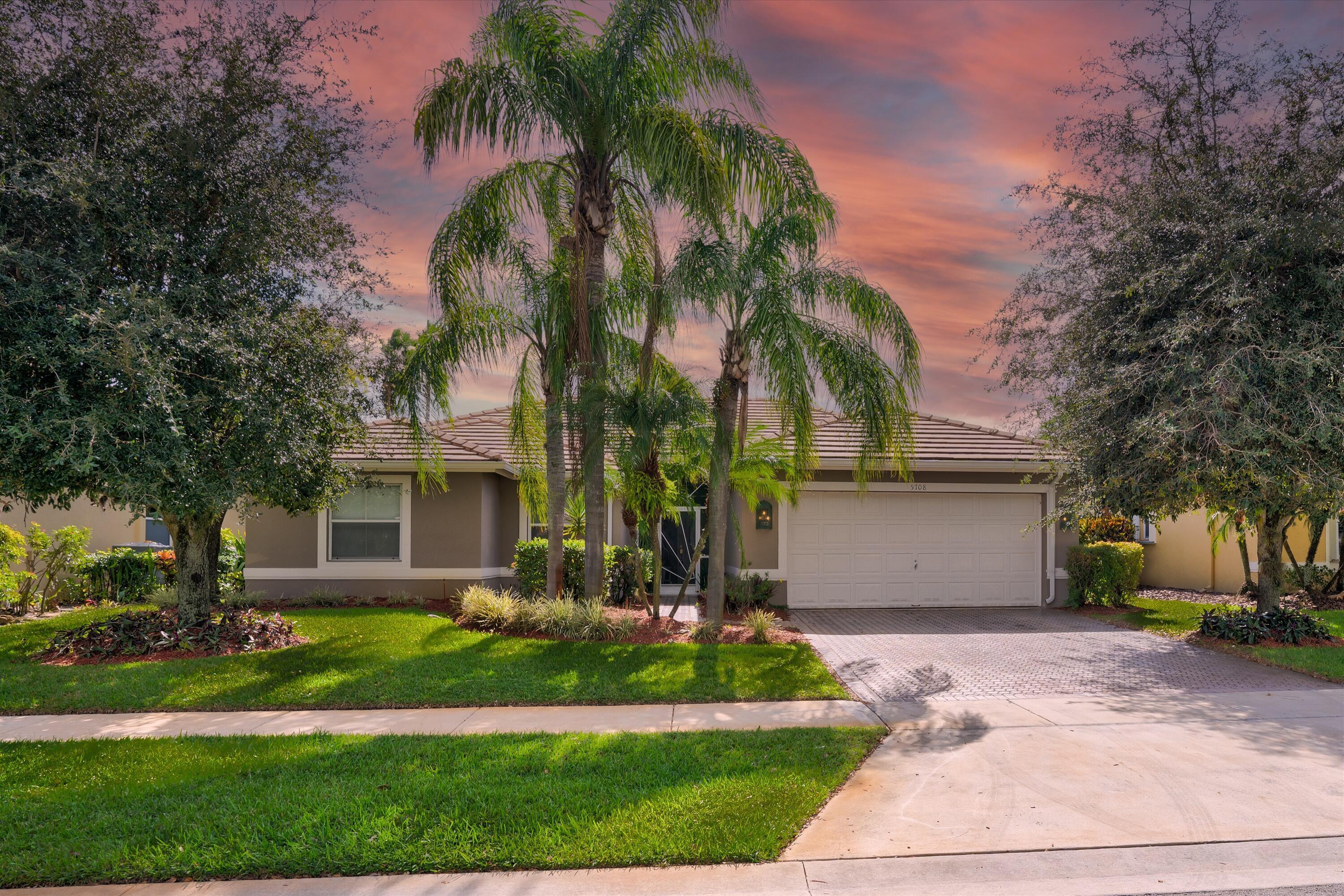 Property Photo:  5708 Muirfield Village Circle  FL 33463 