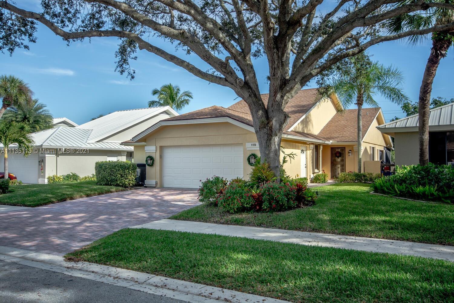 Property Photo: 119 Sand Pine Dr FL 33477
